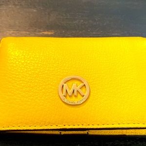 Michael Kors yellow bifold Wallet.